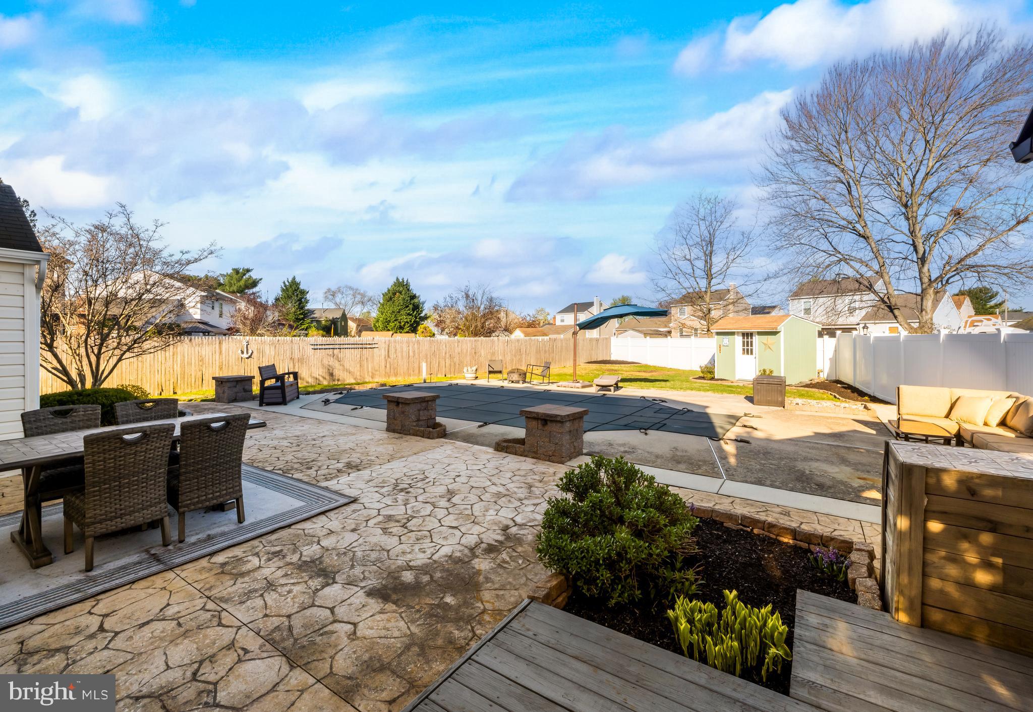 34 Borrelly Boulevard Sewell, NJ 08080 - Photo 23 of 23 a view of a terrace with wooden floor and outdoor seating