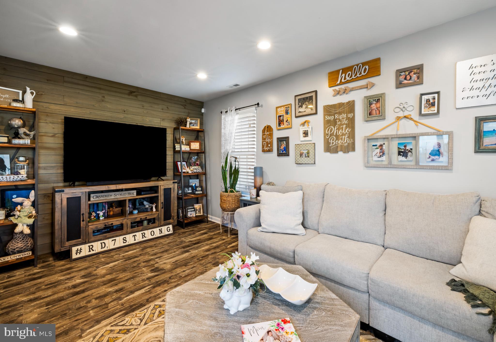 34 Borrelly Boulevard Sewell, NJ 08080 - Photo 9 of 23 a living room with furniture and a flat screen tv