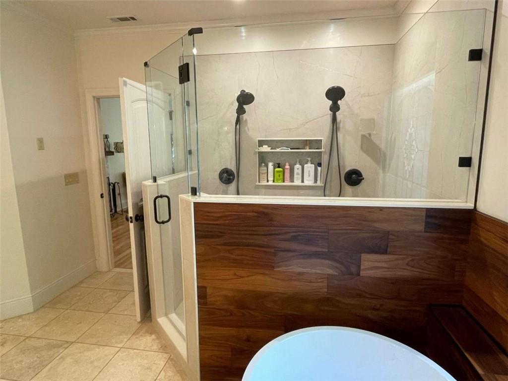 1531 Overlook Pass Road Monroe, GA 30655 - Photo 30 of 78 a bathroom with a sink a toilet and a shower