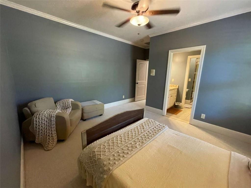 1531 Overlook Pass Road Monroe, GA 30655 - Photo 39 of 78 a bedroom with a bed and window