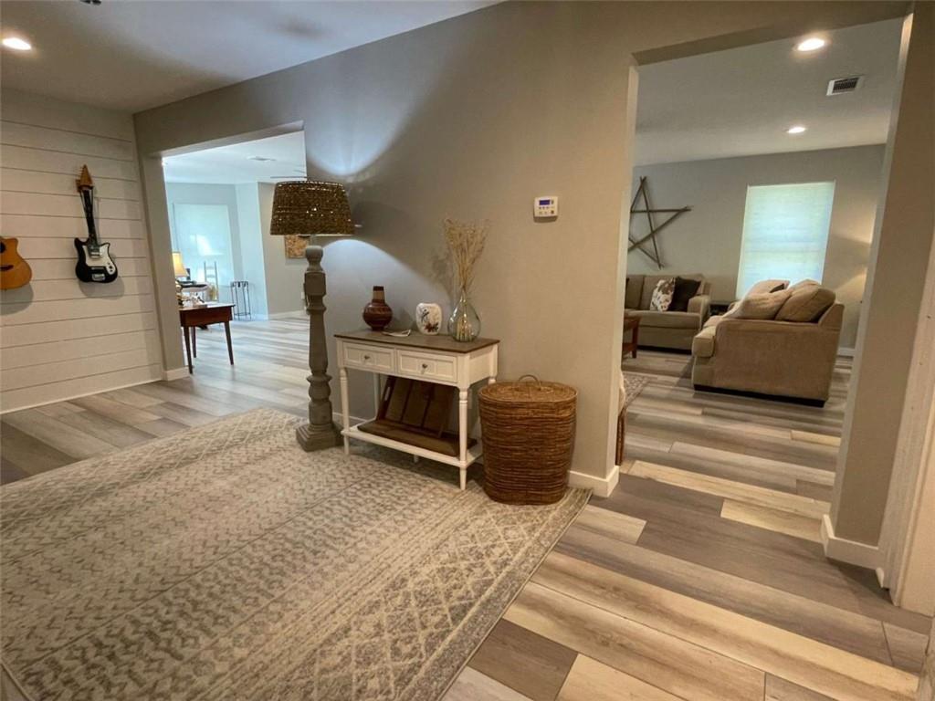 1531 Overlook Pass Road Monroe, GA 30655 - Photo 51 of 78 a living room with furniture a couch and potted plant