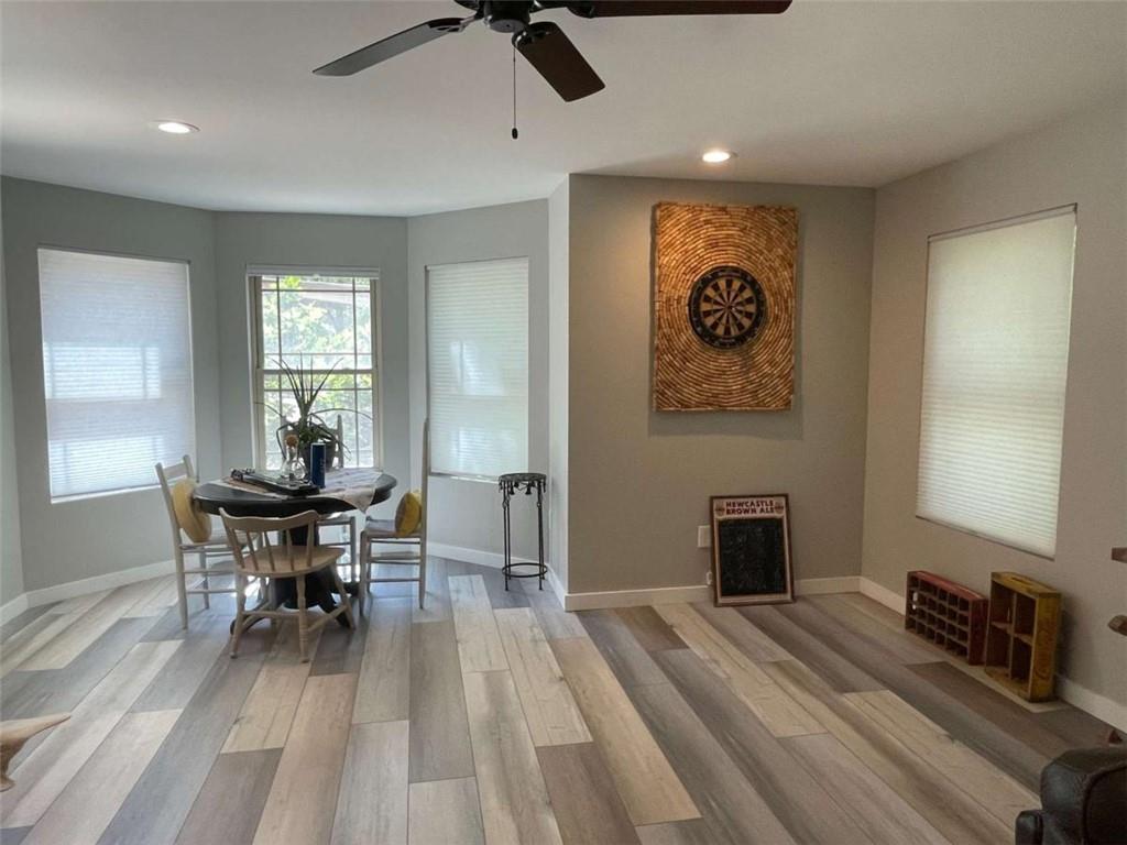 1531 Overlook Pass Road Monroe, GA 30655 - Photo 64 of 78 a workspace with furniture window and wooden floor