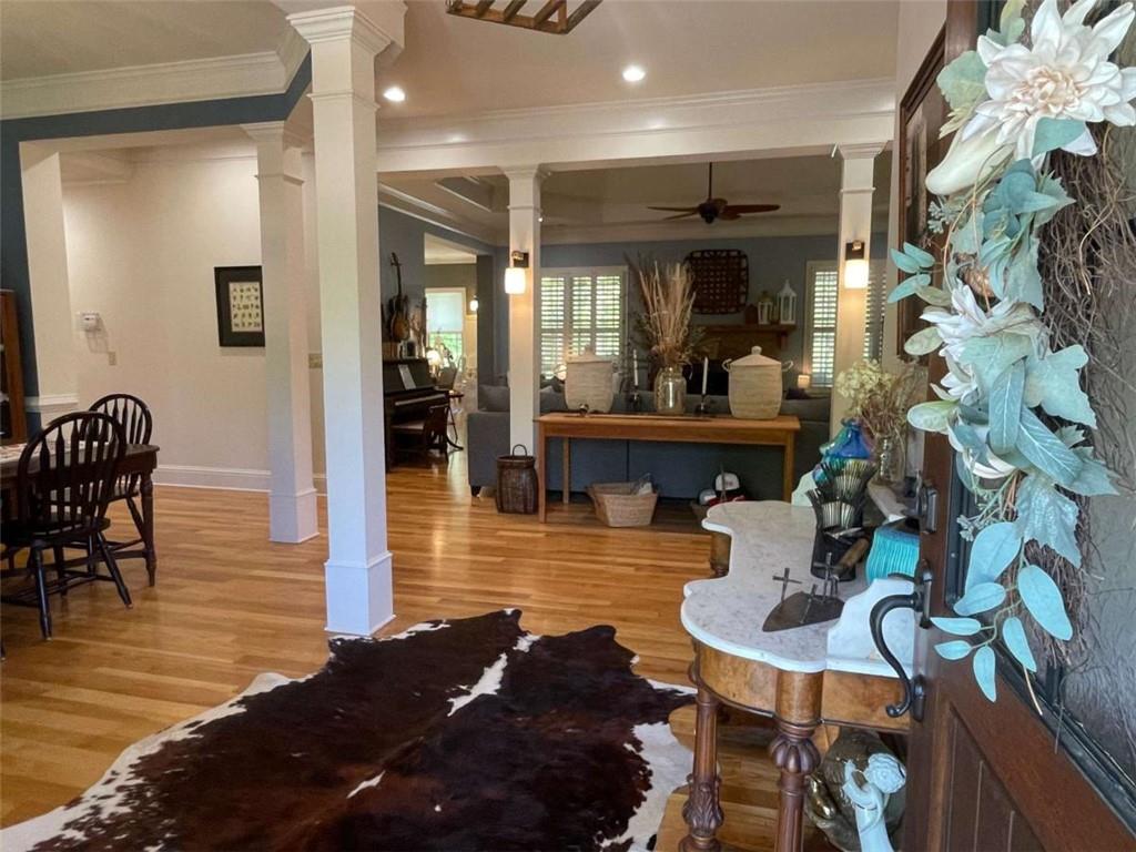 1531 Overlook Pass Road Monroe, GA 30655 - Photo 7 of 78 a living room with fireplace furniture and a wooden floor