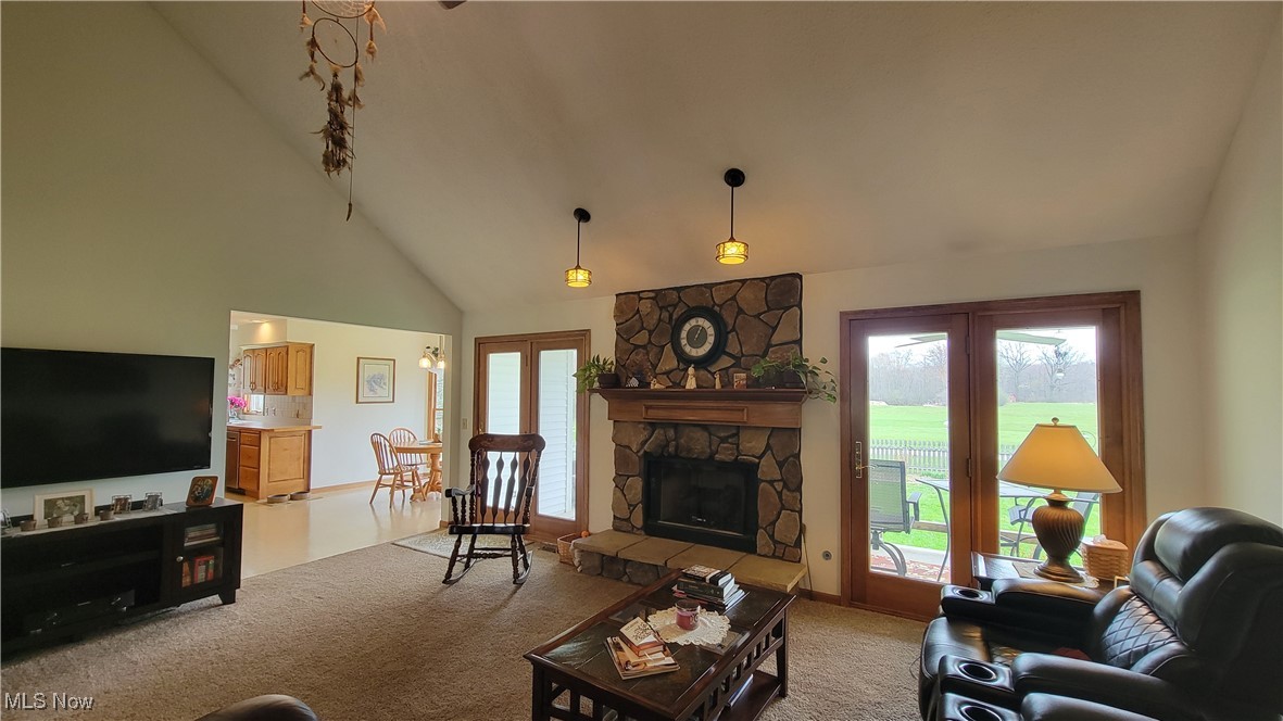 16399 Quarry Road Wellington, OH 44090 - Photo 7 of 50 Double french doors leading to covered back porch