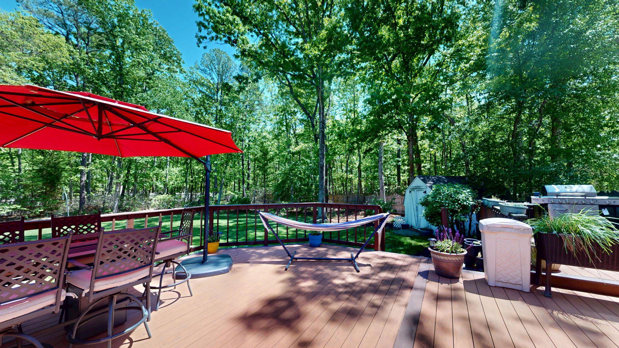 3 Colonial Court Medford, NJ 08055 - Photo 75 of 89 Serene deck retreat in lush greenery.