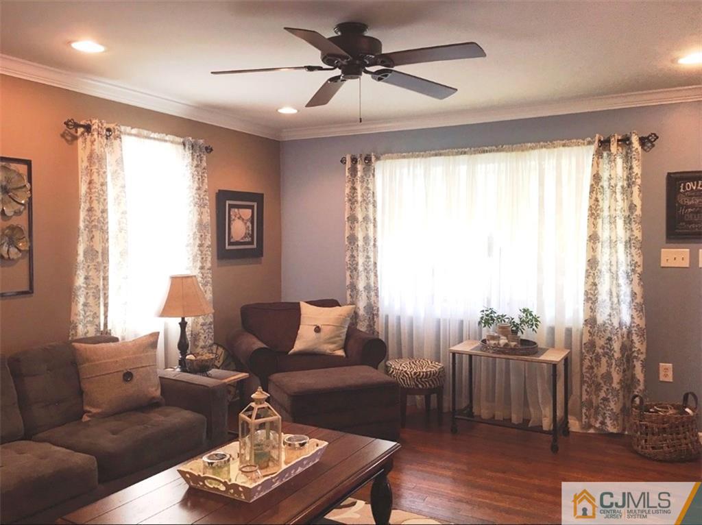 50 Dover Road Colonia, NJ 07067 - Photo 3 of 11 a living room with furniture and a large window