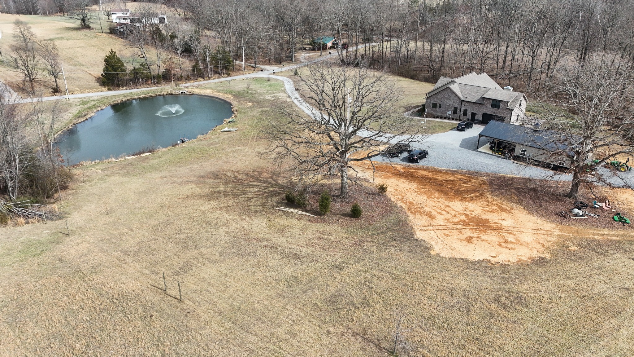 138 Belcher Hollow Road Cottontown, TN 37048 - Photo 11 of 59 a view of a swimming pool with a yard