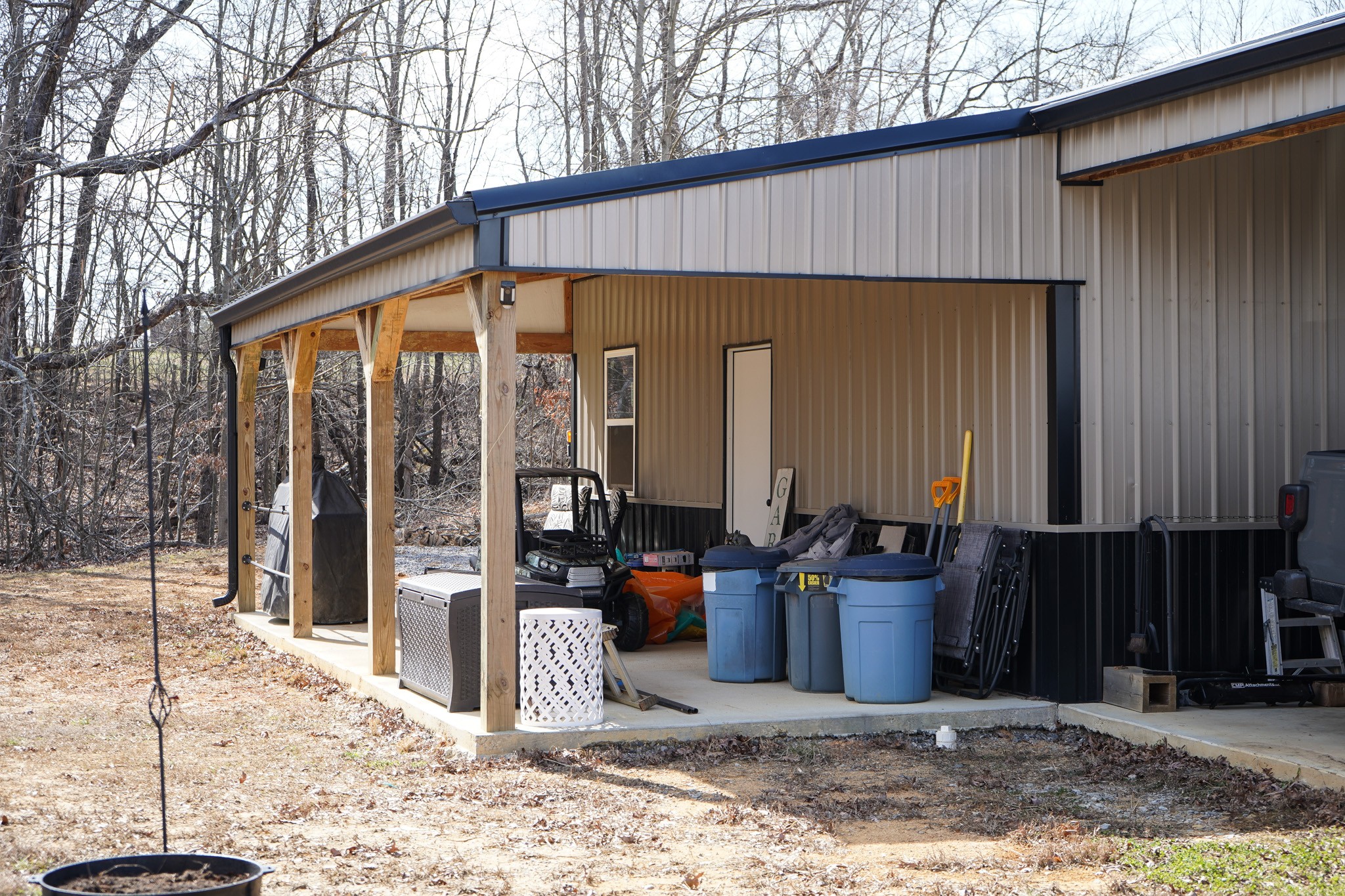 138 Belcher Hollow Road Cottontown, TN 37048 - Photo 16 of 59 a front view of a house with a garden