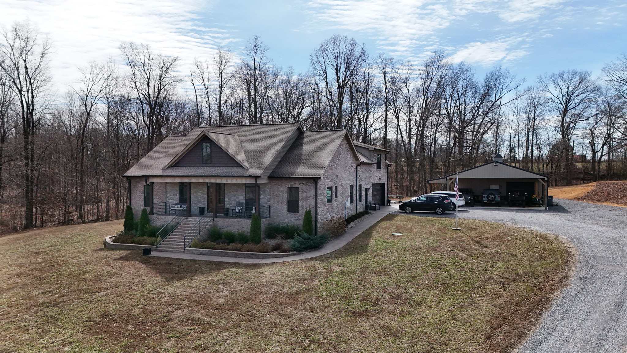 138 Belcher Hollow Road Cottontown, TN 37048 - Photo 2 of 59 a view of a house with a yard