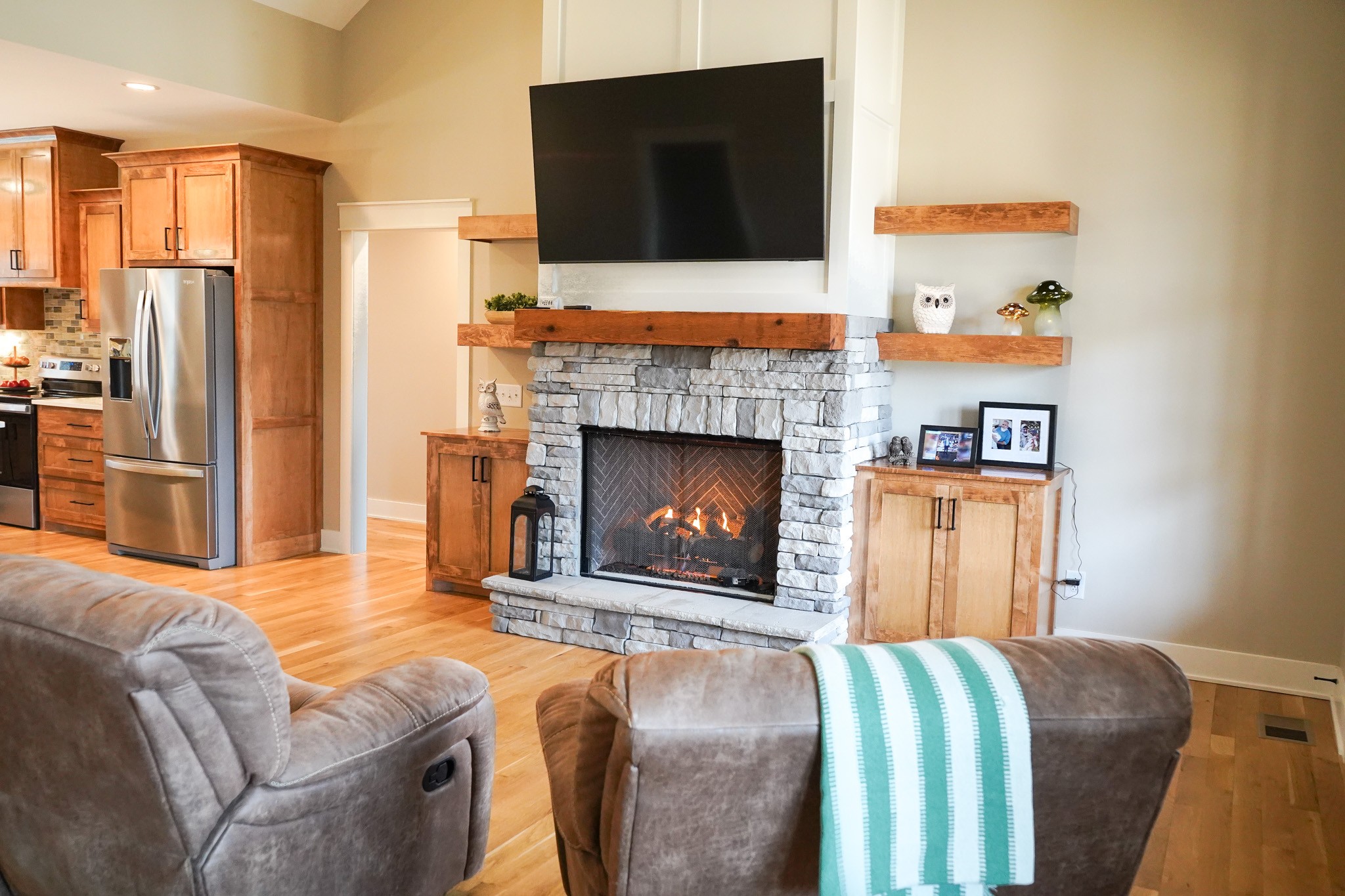 138 Belcher Hollow Road Cottontown, TN 37048 - Photo 24 of 59 a living room with furniture fireplace and flat screen tv