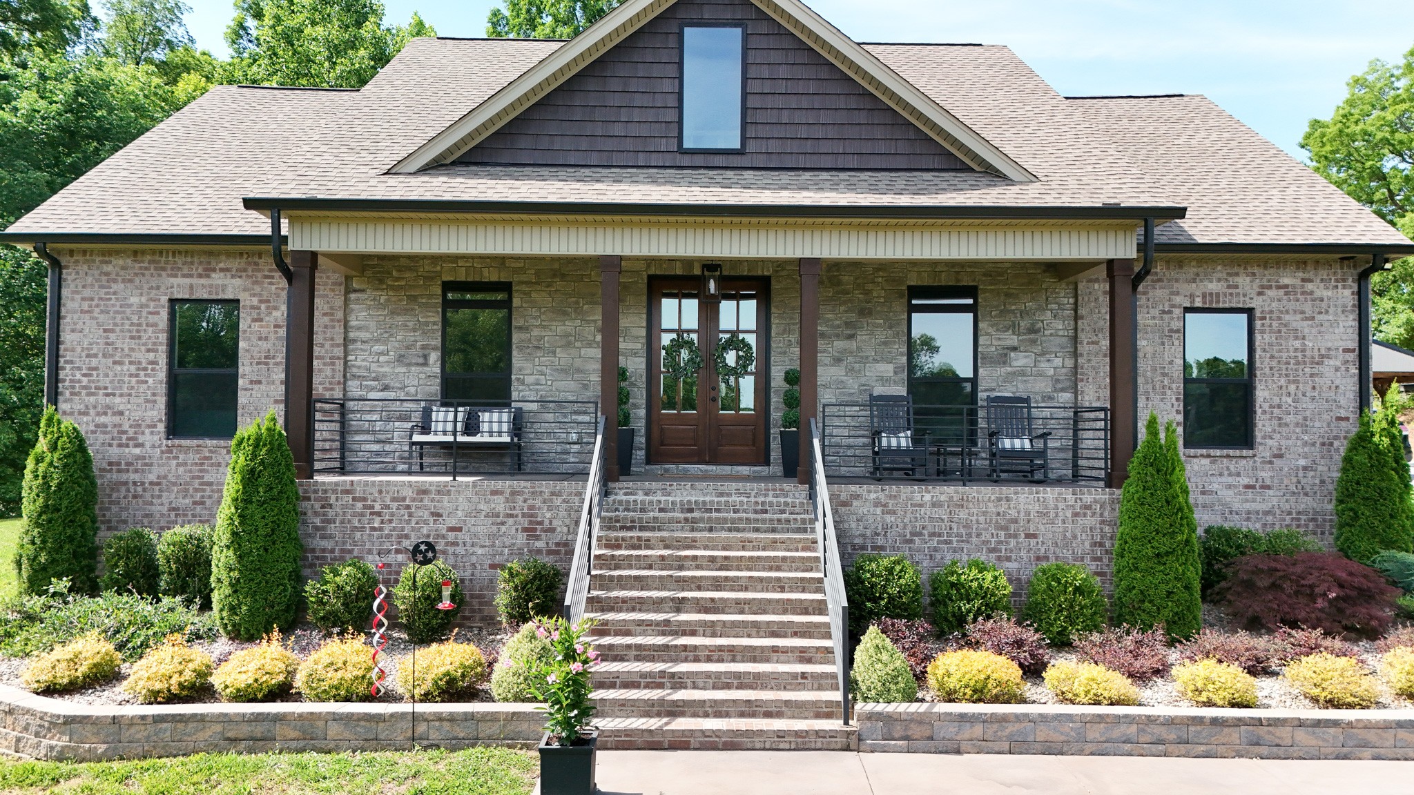 138 Belcher Hollow Road Cottontown, TN 37048 - Photo 3 of 60 a front view of a house with garden