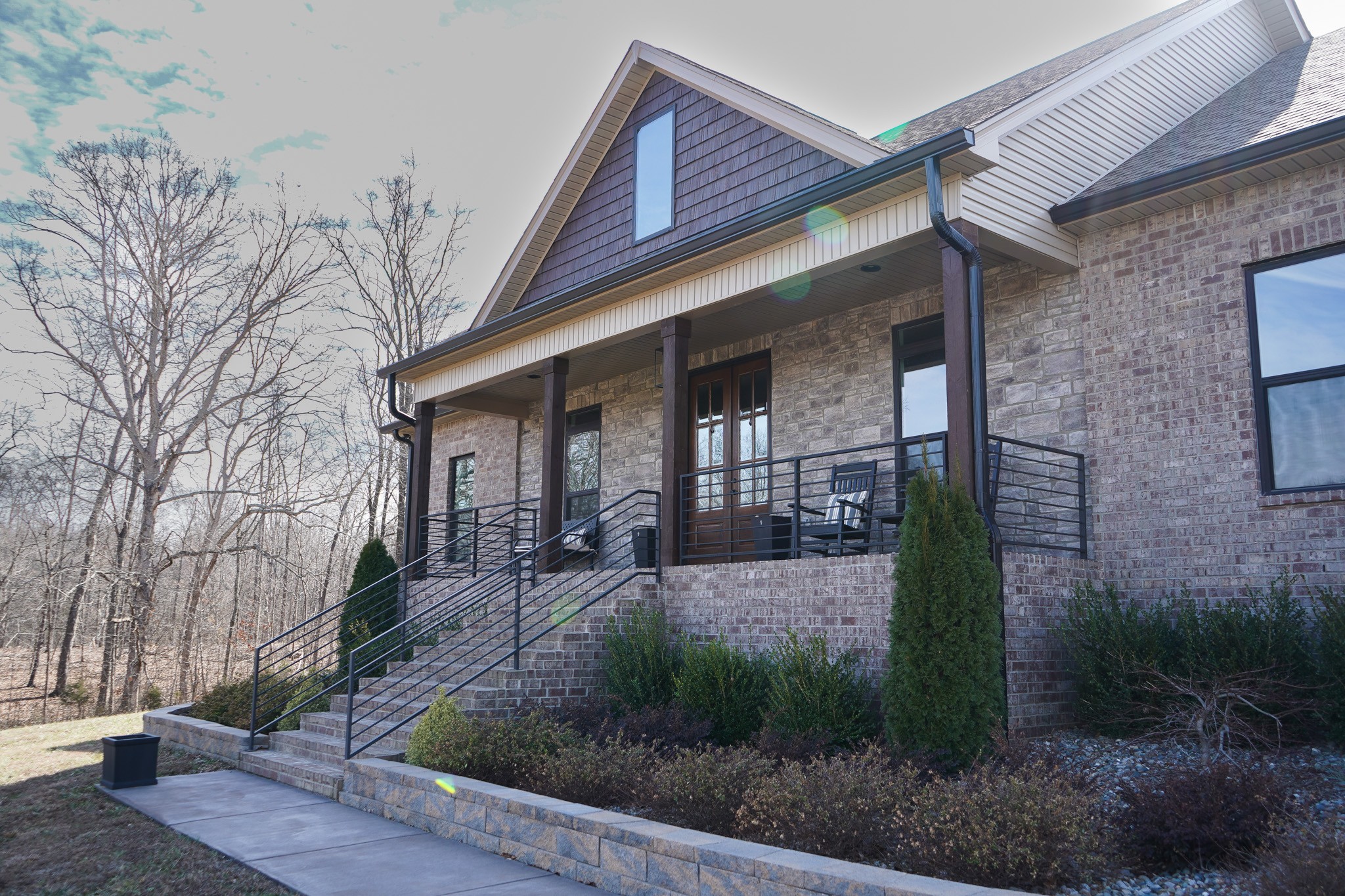138 Belcher Hollow Road Cottontown, TN 37048 - Photo 4 of 59 a front view of a house with garden