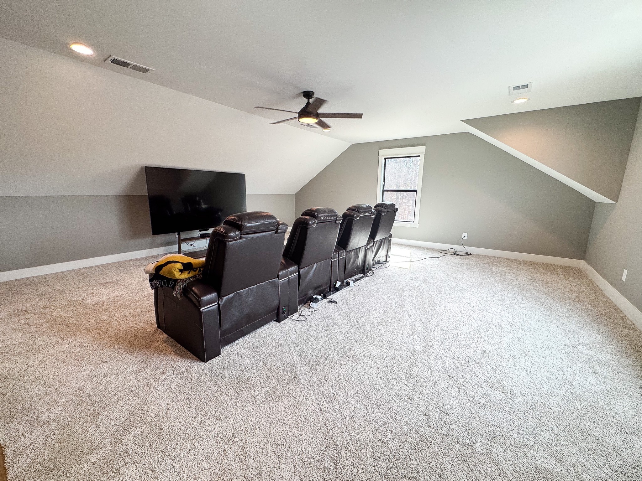 138 Belcher Hollow Road Cottontown, TN 37048 - Photo 43 of 59 a living room with furniture and a flat screen tv