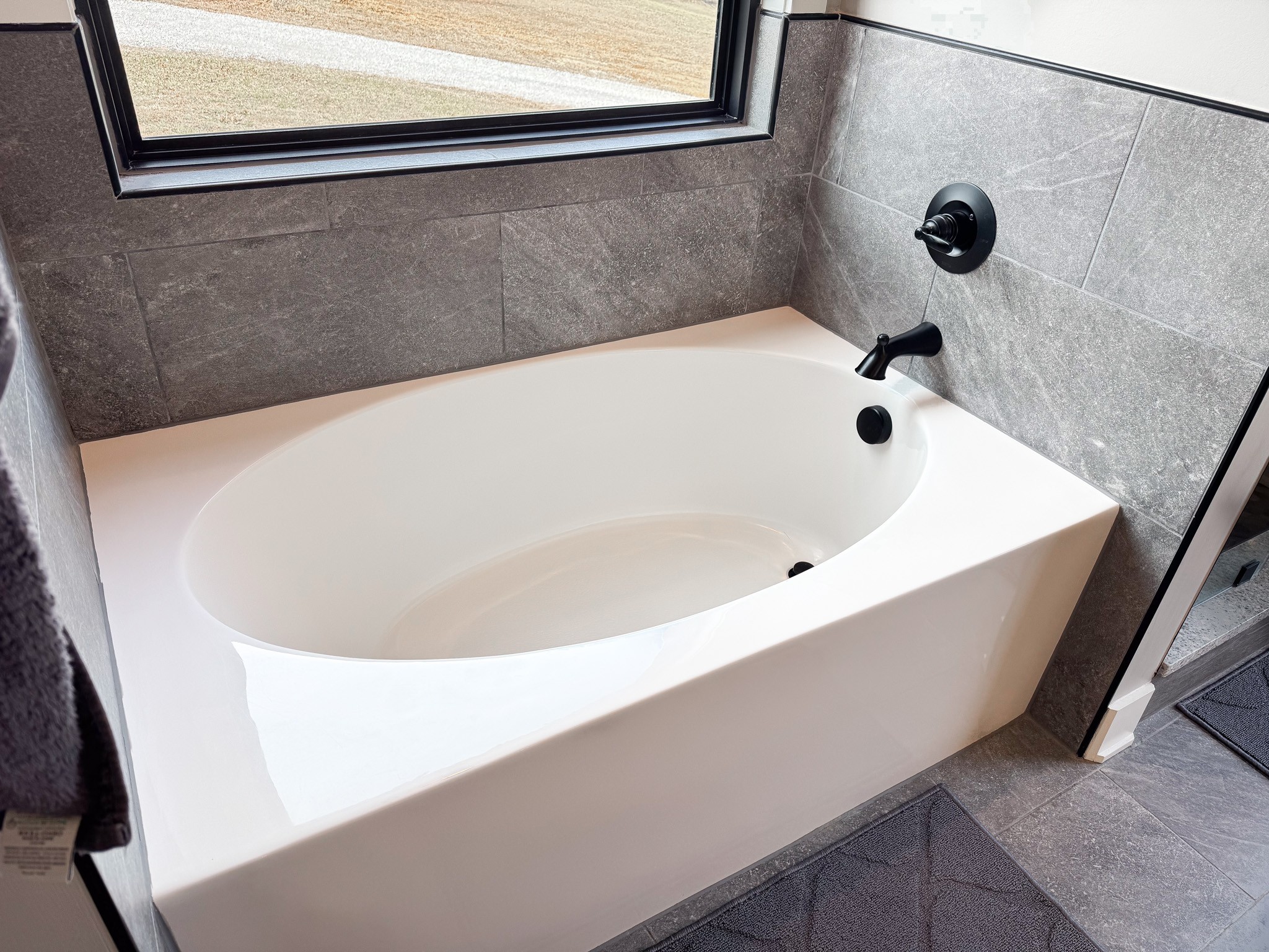 138 Belcher Hollow Road Cottontown, TN 37048 - Photo 49 of 60 a bathroom with a bathtub