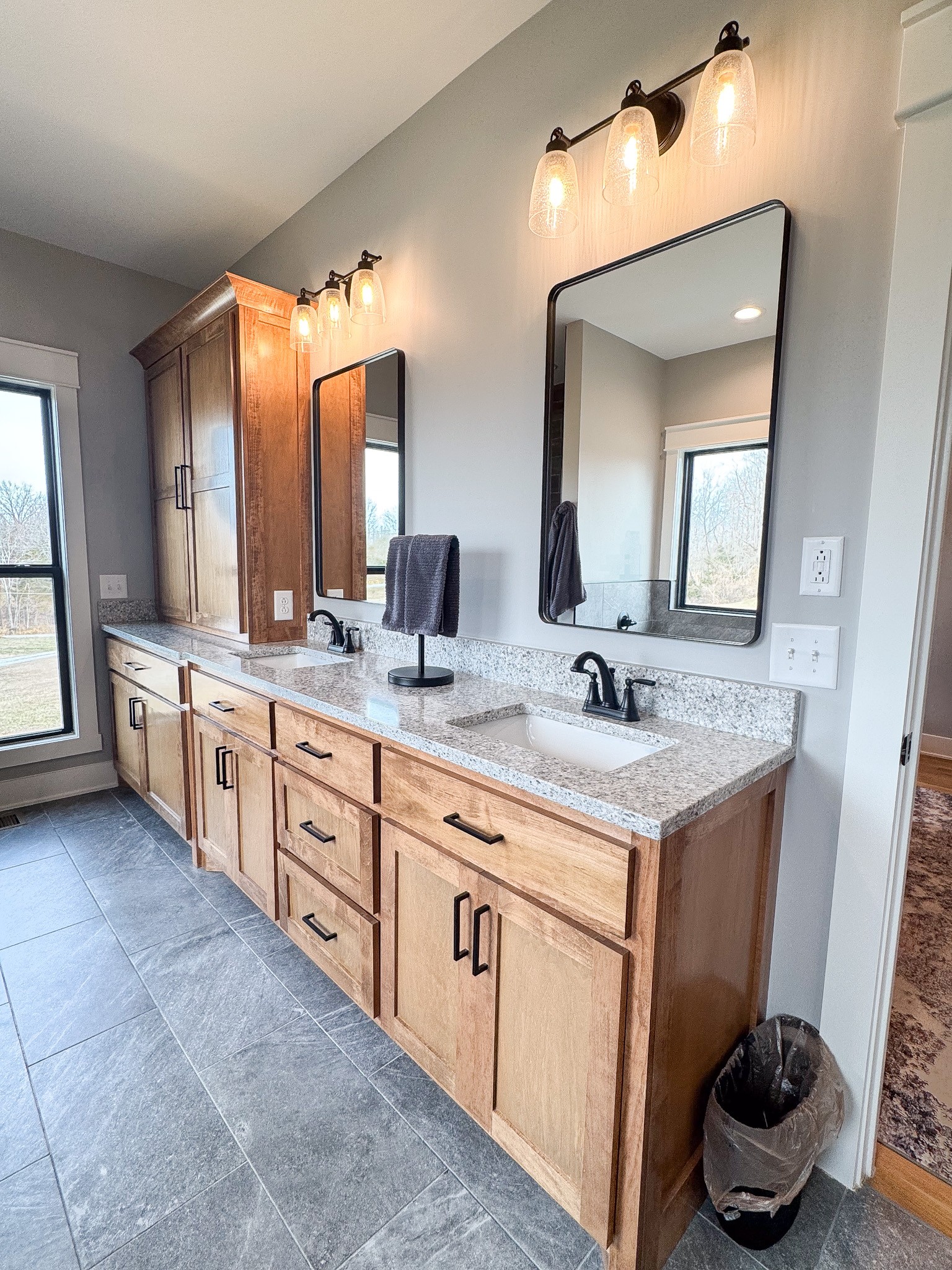 138 Belcher Hollow Road Cottontown, TN 37048 - Photo 51 of 60 a spacious bathroom with a granite countertop sink and a mirror