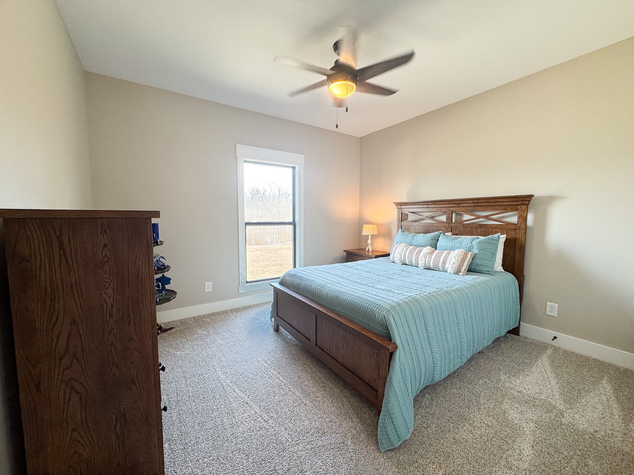 138 Belcher Hollow Road Cottontown, TN 37048 - Photo 54 of 60 a bedroom with a bed and a window