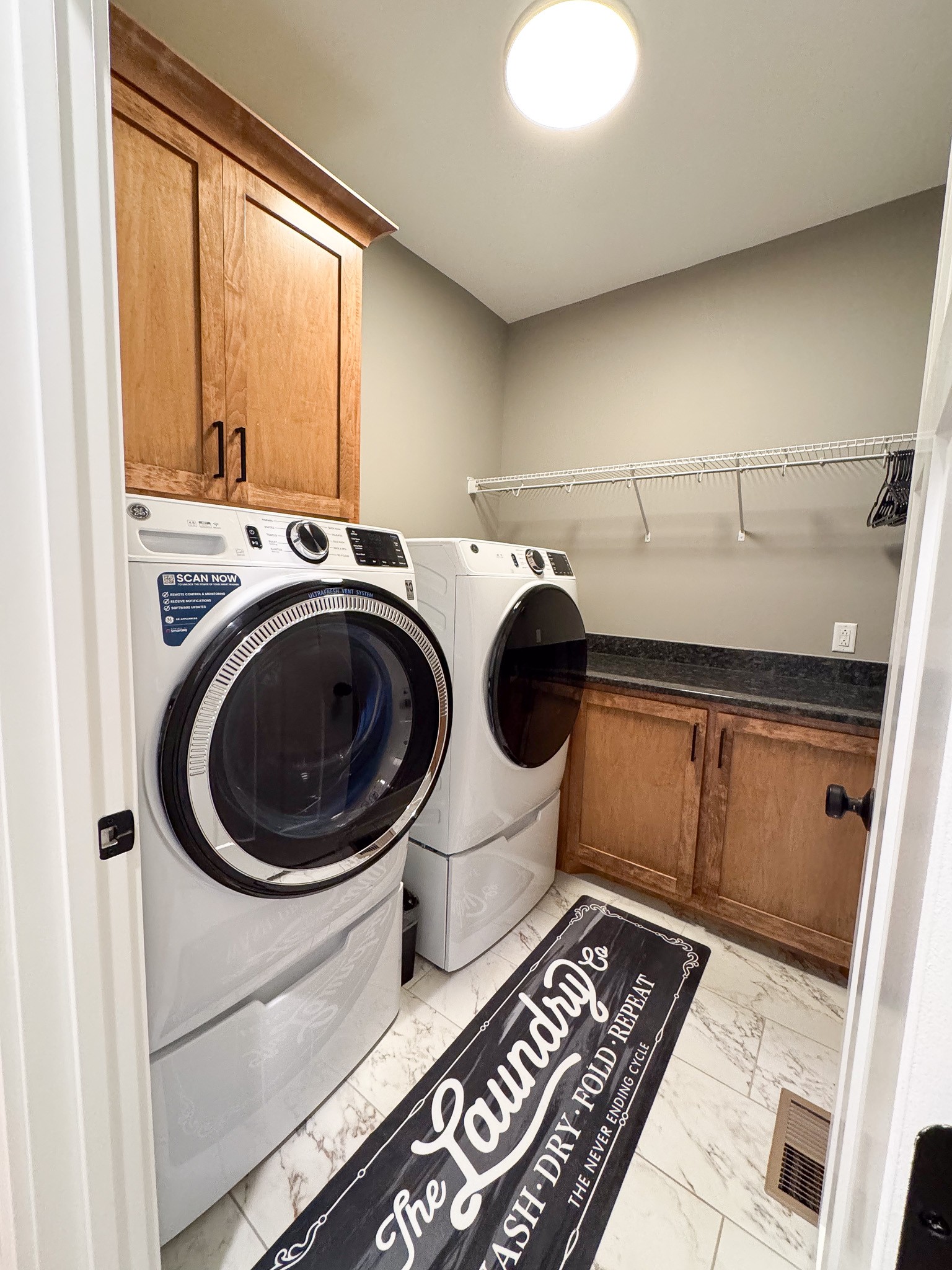 138 Belcher Hollow Road Cottontown, TN 37048 - Photo 59 of 59 a utility room with dryer and washer