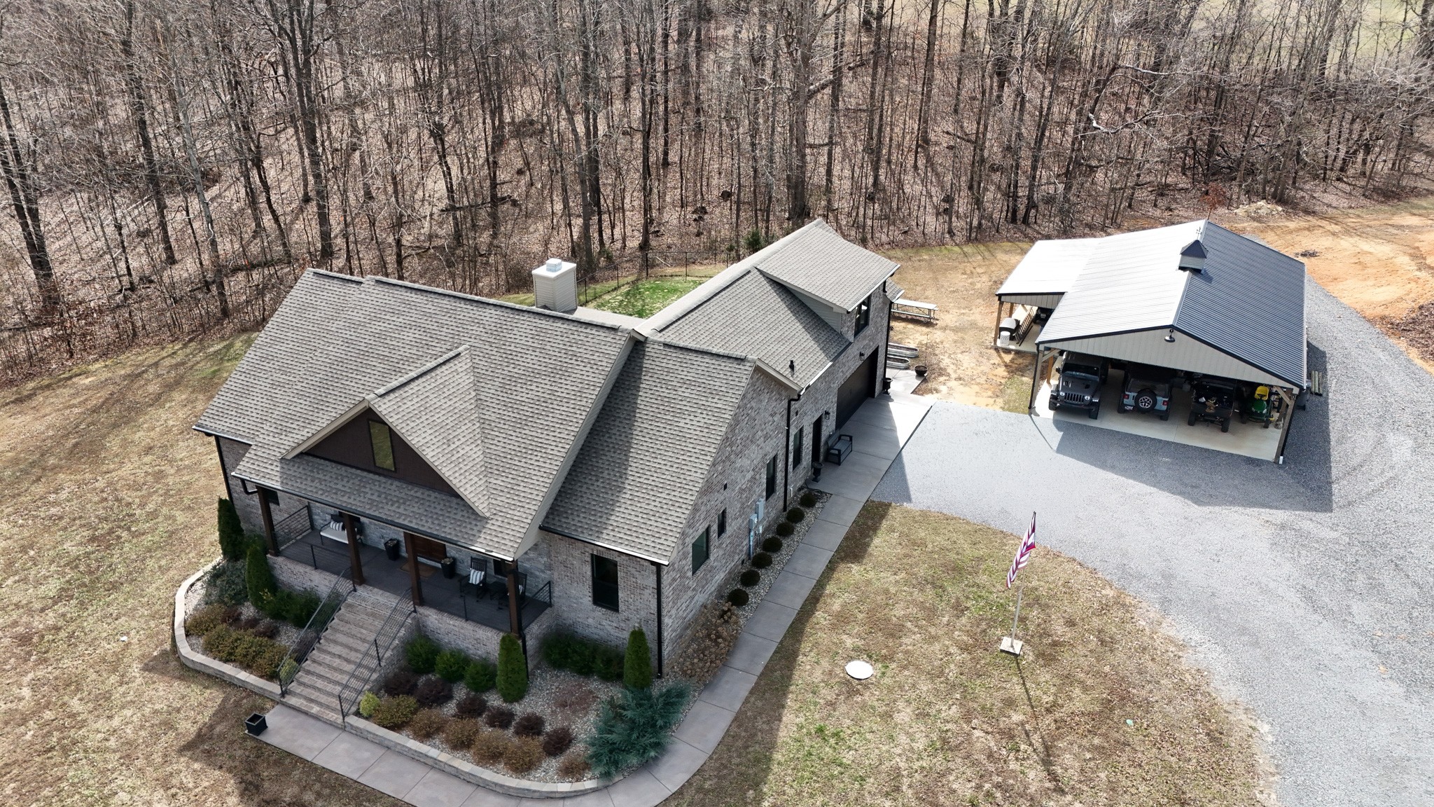 138 Belcher Hollow Road Cottontown, TN 37048 - Photo 6 of 59 an aerial view of a house with a yard and furniture
