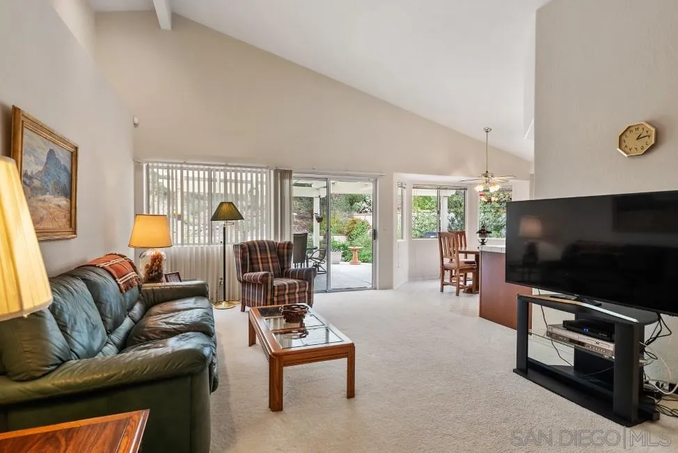 13873 Carriage Road Poway, CA 92064 - Photo 15 of 32 a living room with furniture and a flat screen tv