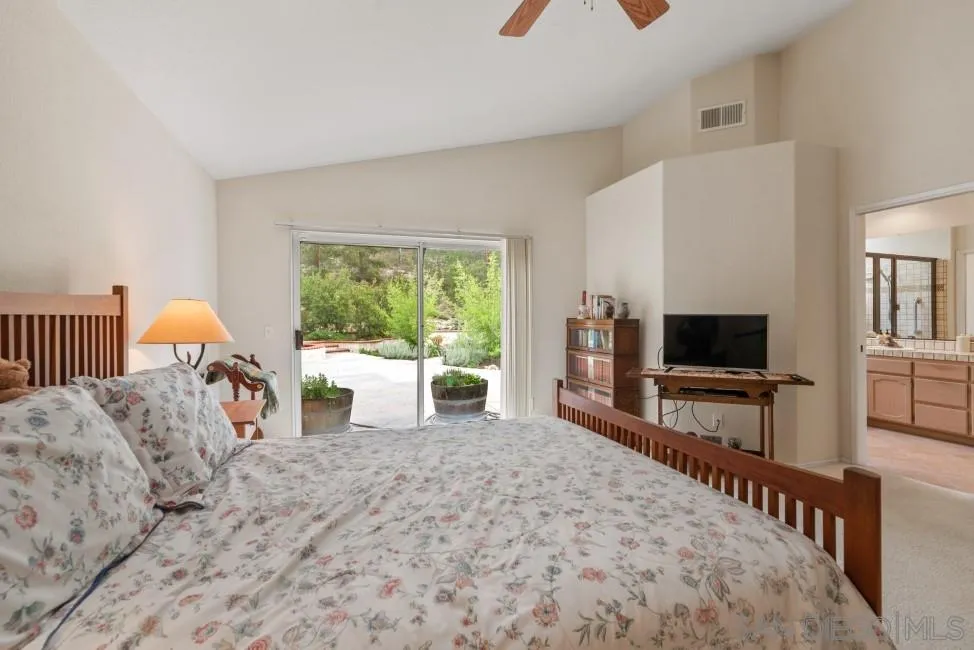 13873 Carriage Road Poway, CA 92064 - Photo 17 of 32 a living room with furniture and a flat screen tv