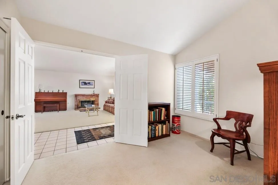 13873 Carriage Road Poway, CA 92064 - Photo 19 of 32 a room with furniture and a window