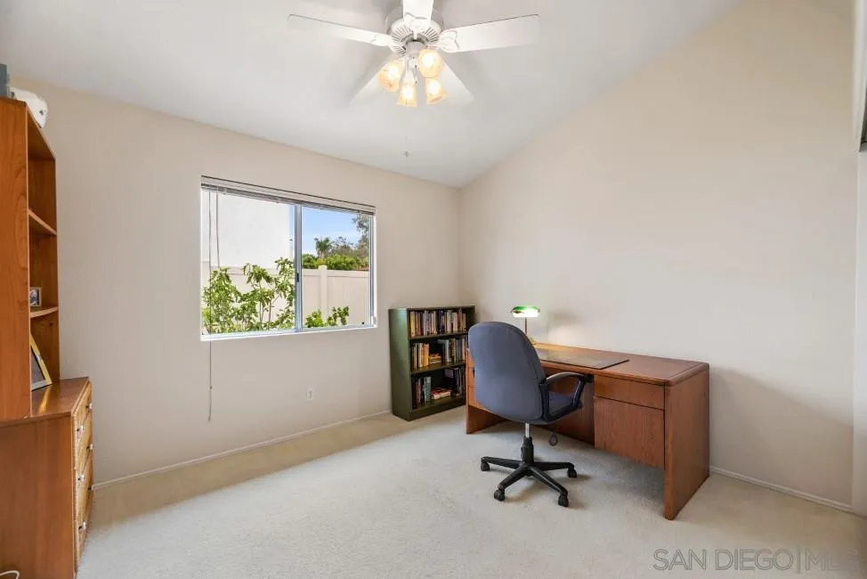 13873 Carriage Road Poway, CA 92064 - Photo 20 of 32 a view of a workspace with furniture and a window