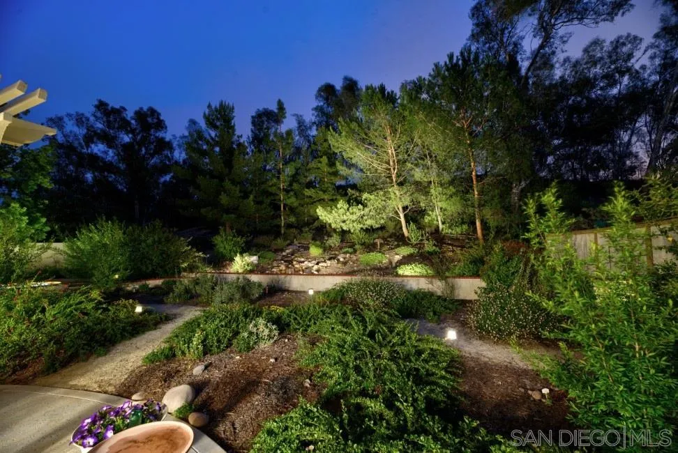 13873 Carriage Road Poway, CA 92064 - Photo 27 of 32 a view of a garden with an outdoor space