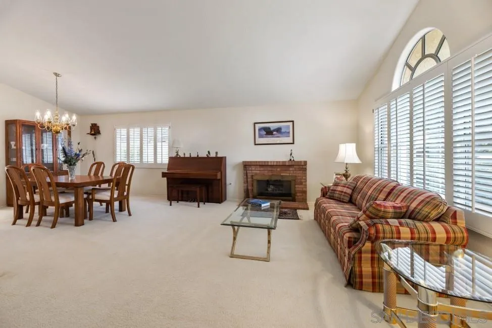 13873 Carriage Road Poway, CA 92064 - Photo 8 of 32 a living room with furniture and a fireplace