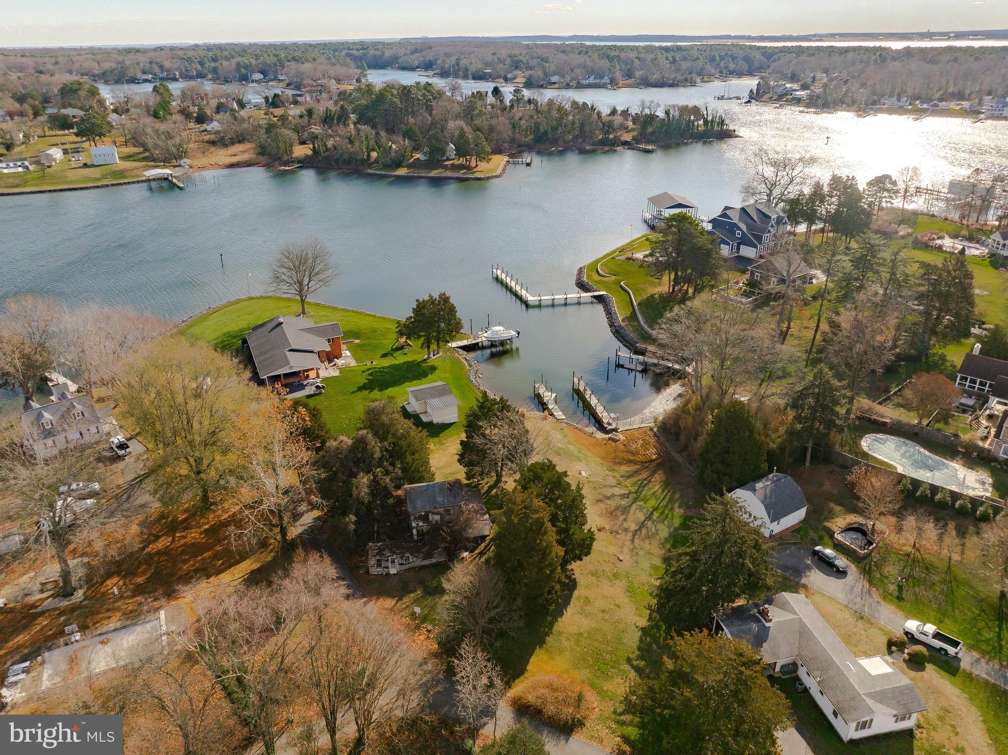 610 Rolling Hills Road Solomons, MD 20629 - Photo 14 of 33 an aerial view of lake residential house with outdoor space and trees