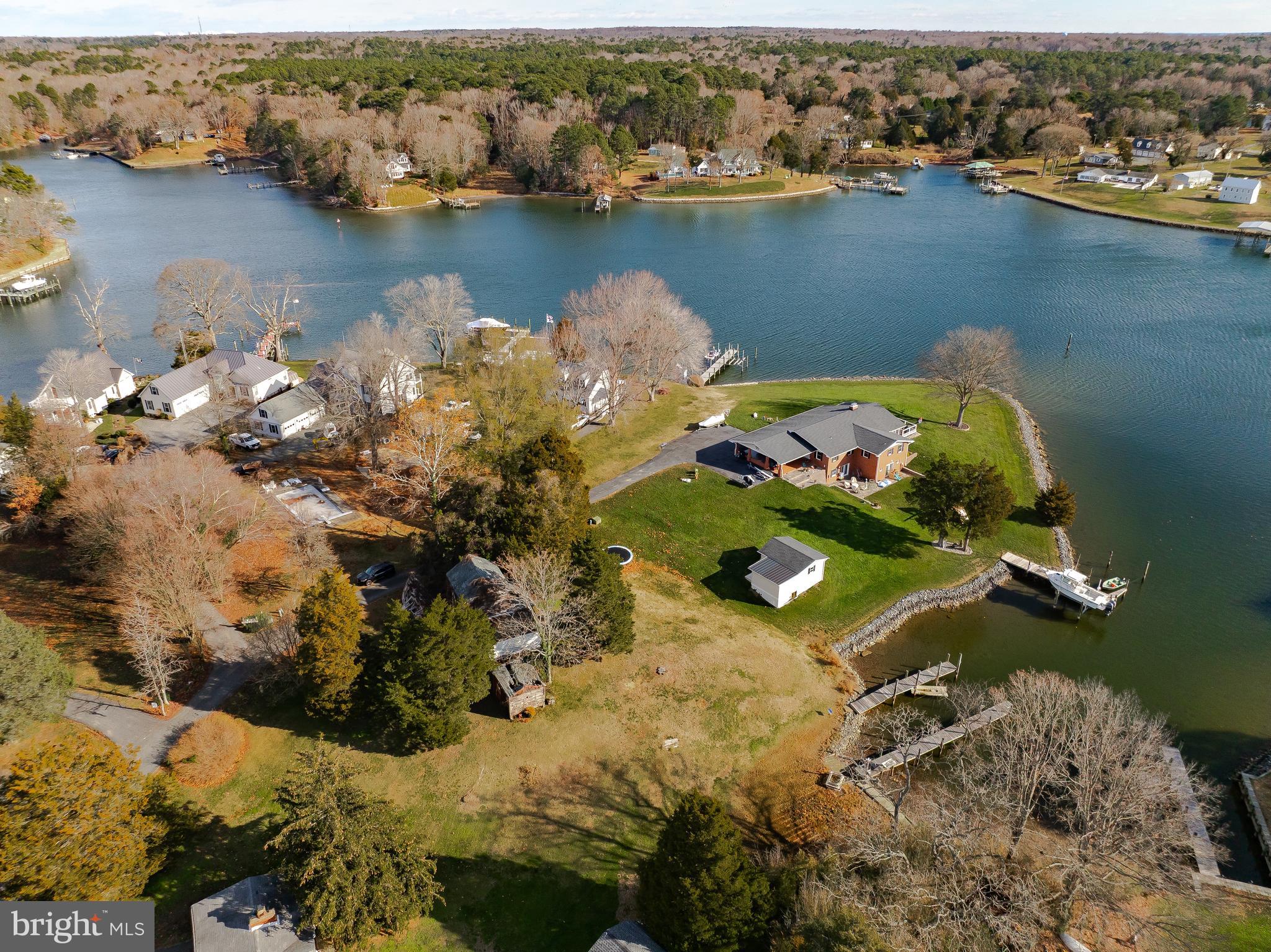 610 Rolling Hills Road Solomons, MD 20629 - Photo 18 of 33 an aerial view of a house with a lake view