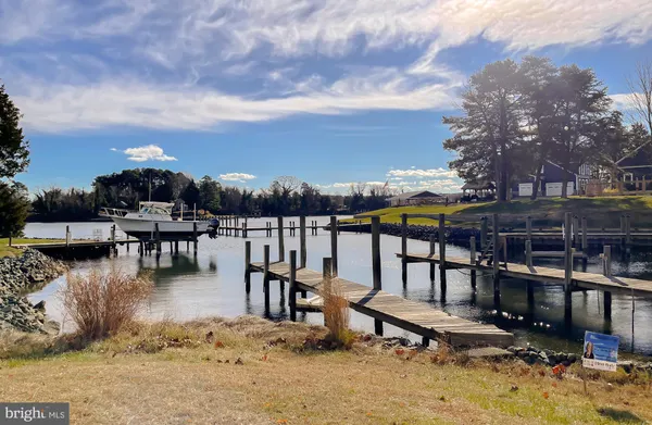 a view of a swimming pool with an outdoor seating