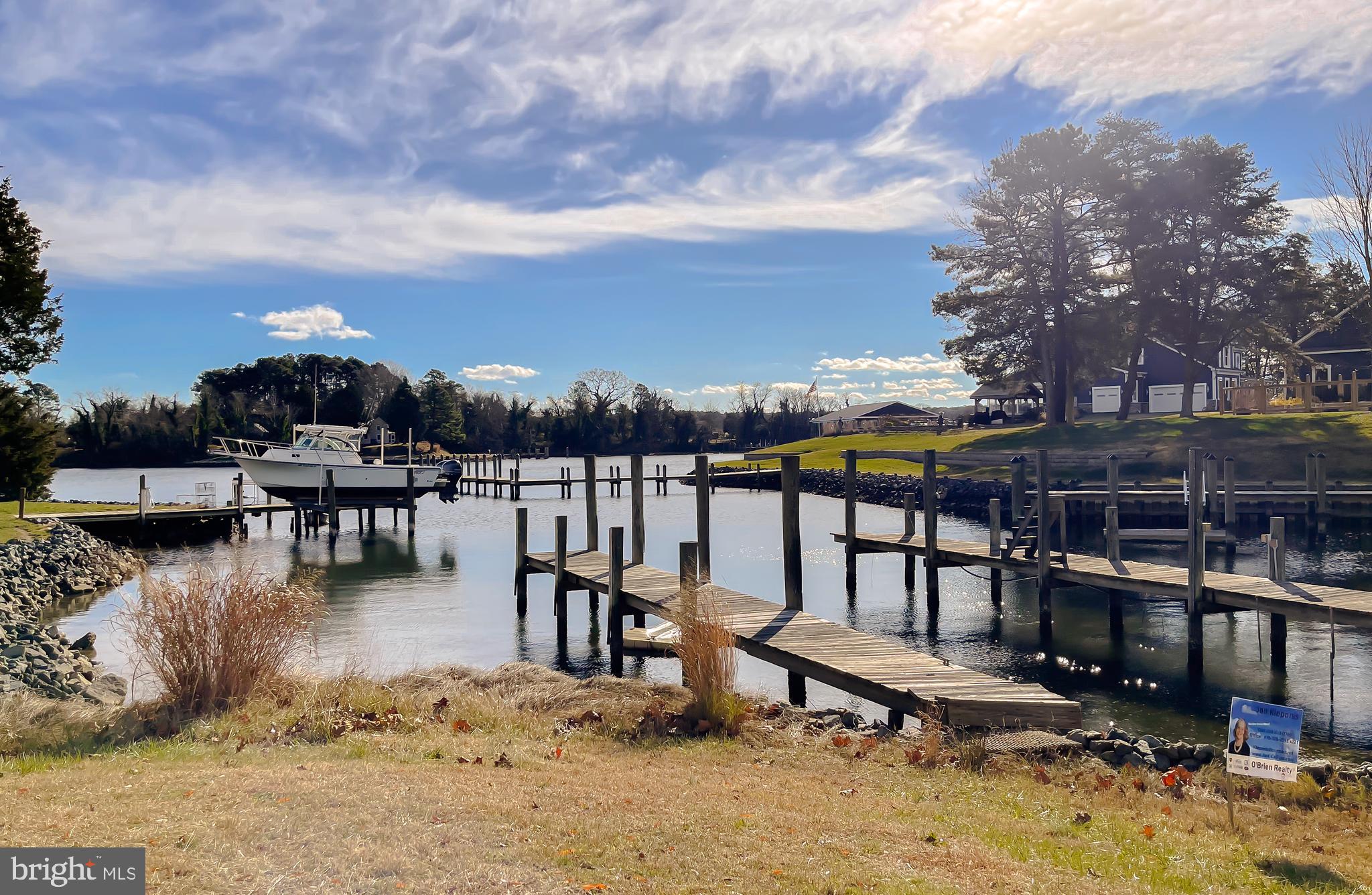 610 Rolling Hills Road Solomons, MD 20629 - Photo 2 of 33 a view of a swimming pool with an outdoor seating