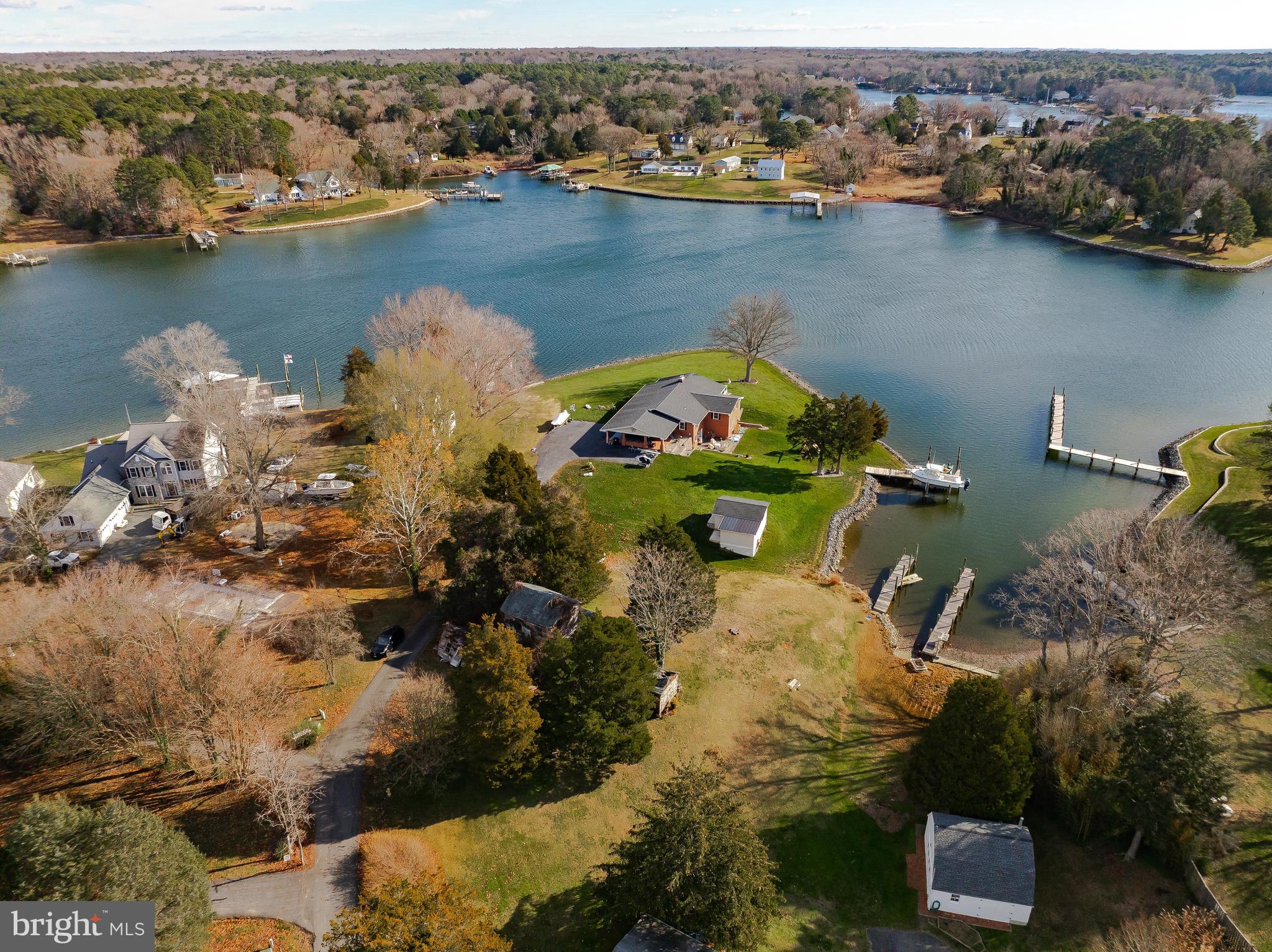 610 Rolling Hills Road Solomons, MD 20629 - Photo 22 of 43 an aerial view of a house with a lake view
