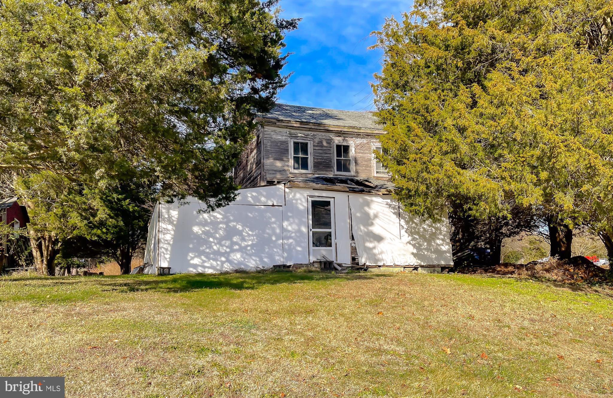 610 Rolling Hills Road Solomons, MD 20629 - Photo 26 of 33 a view of a house with a yard