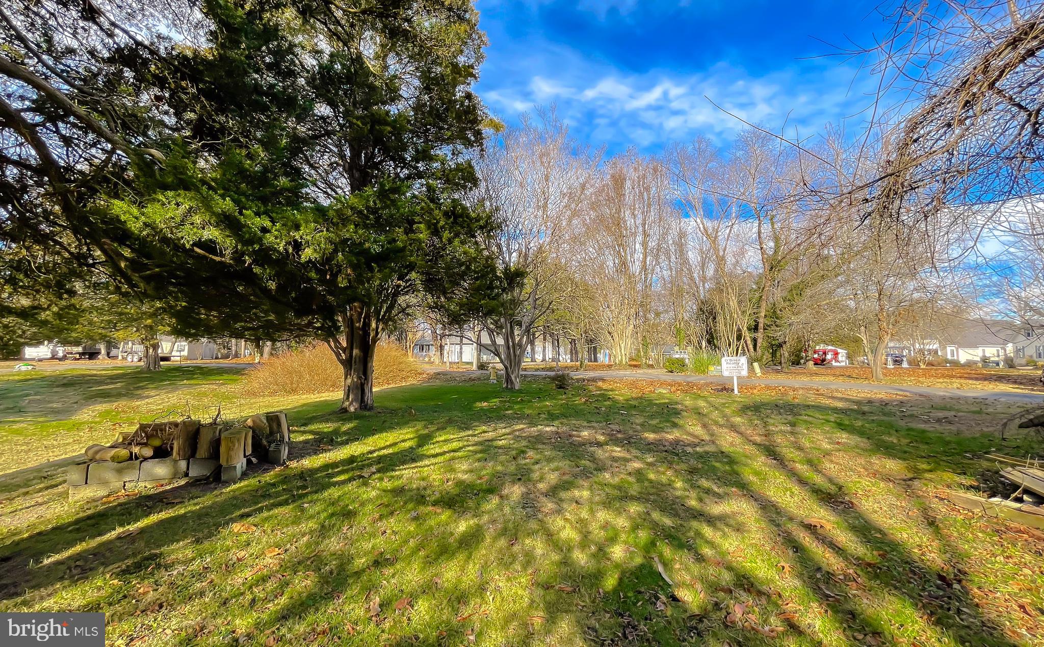 610 Rolling Hills Road Solomons, MD 20629 - Photo 28 of 33 a view of an outdoor space and a yard