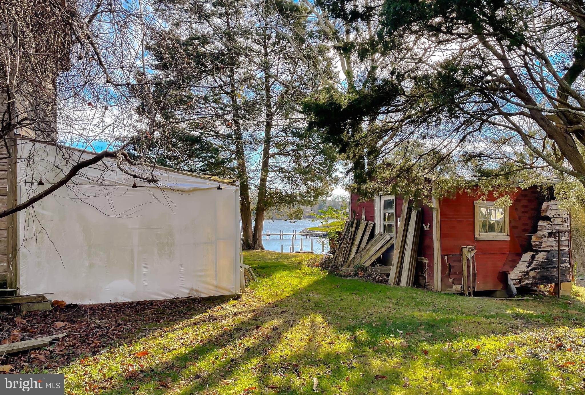 610 Rolling Hills Road Solomons, MD 20629 - Photo 29 of 33 a view of a backyard with large trees