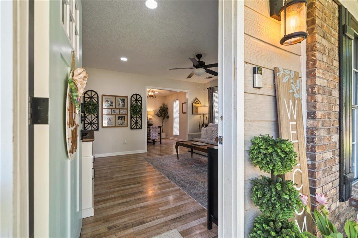 7300 Country Side Road Memphis, TN 38133 - Photo 4 of 22 Front entry with light wood-finish flooring, recessed lighting, and a ceiling fan