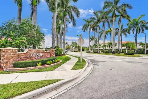 a view of a park with palm trees