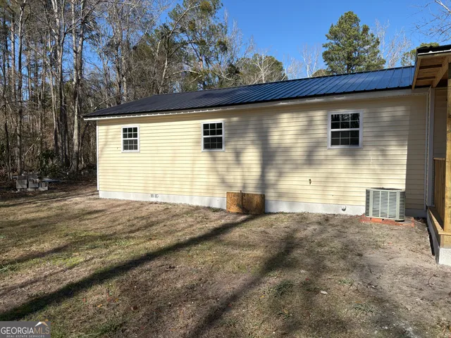 a view of backyard of house