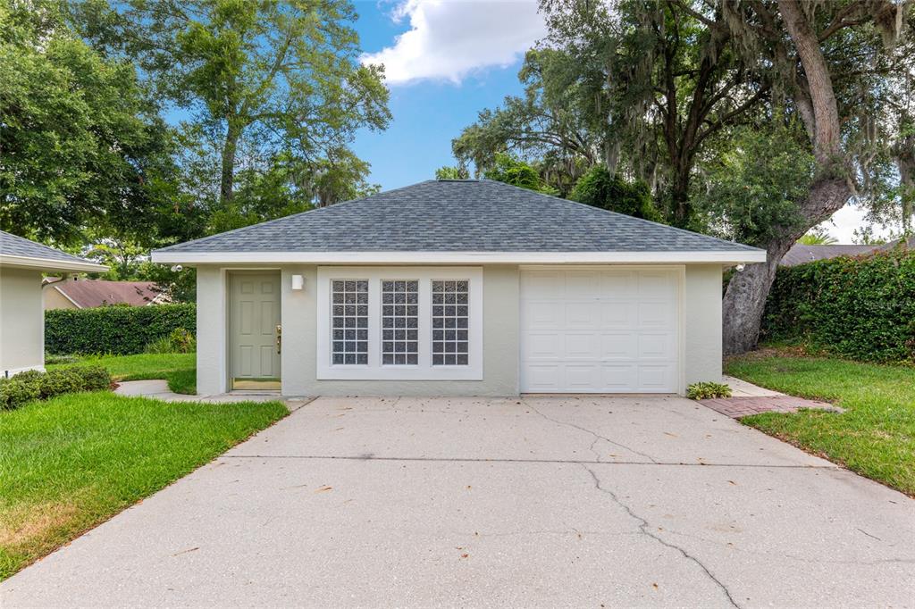 2215 Spring Hill Court Ocala, FL 34471 - Photo 56 of 62 a house view with a garden space
