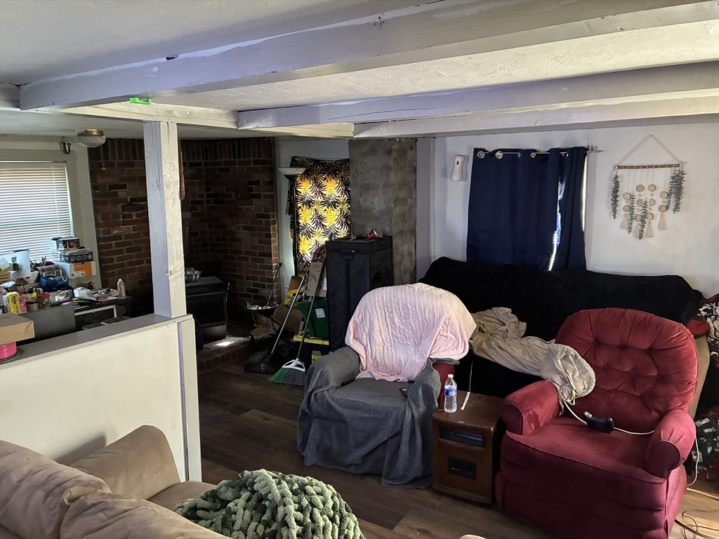 129 Commercial Street Whitman, MA 02382 - Photo 5 of 10 a living room with furniture