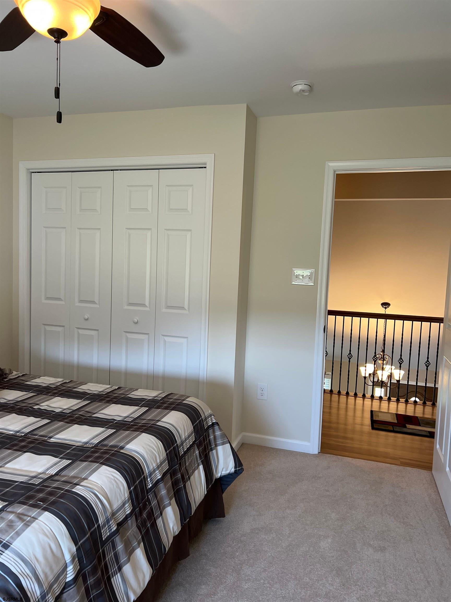 215 Lebanon Road Bridgeton, NJ 08302 - Photo 17 of 50 a bed sitting in a bedroom next to a window