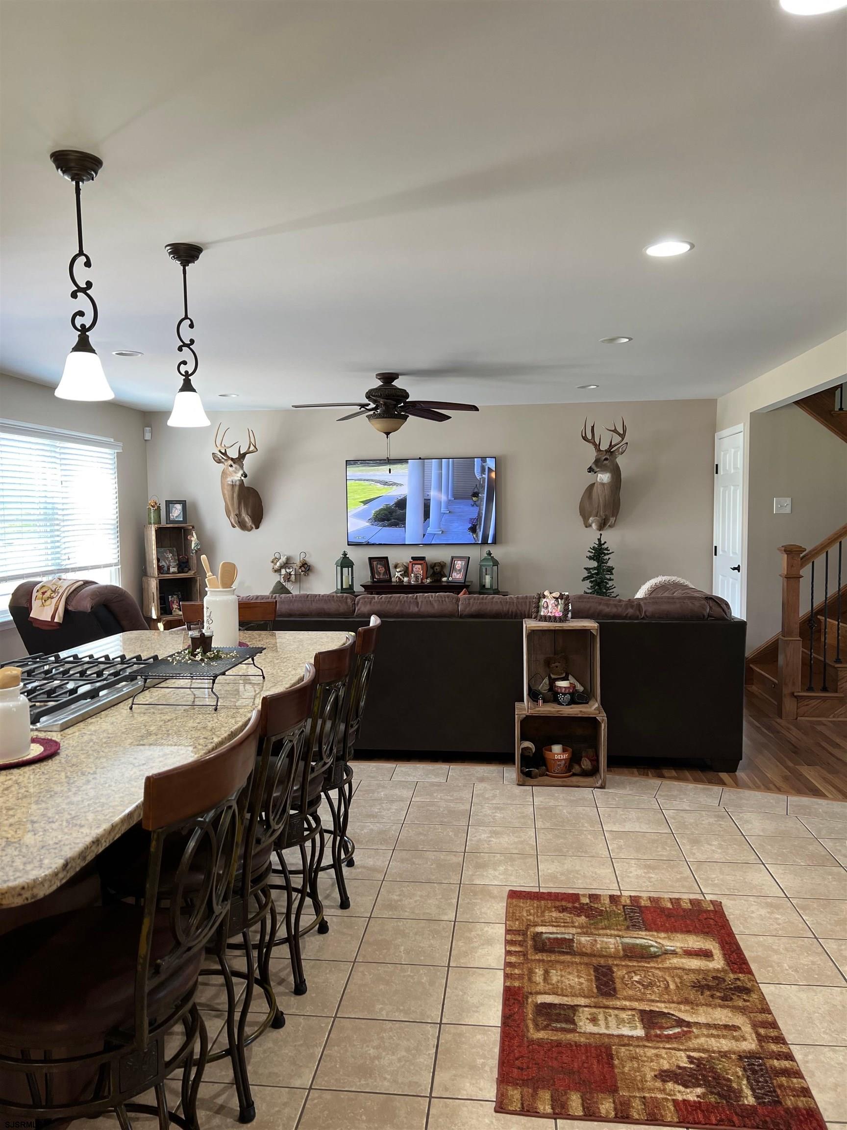 215 Lebanon Road Bridgeton, NJ 08302 - Photo 25 of 50 a kitchen with a sink a counter and chairs
