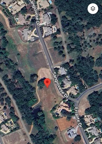 a view of a lake with a big yard