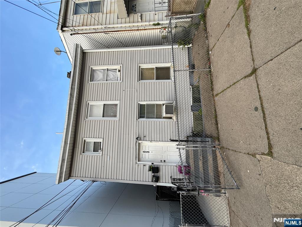 a front view of a house with garage