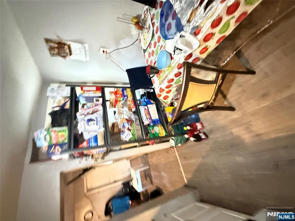 63 Pearl Street Paterson, NJ 07501 - Photo 10 of 16 a room with musical instruments and air hockey table