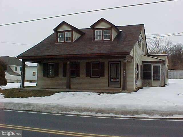 925 South Ridge Road Denver, PA 17517 - Photo 1 of 9 a front view of a house with a yard