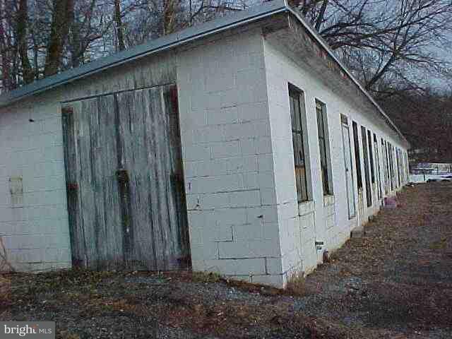 925 South Ridge Road Denver, PA 17517 - Photo 9 of 9 a view of wooden house with a wooden fence