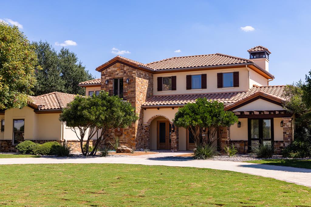 3613 Ranch View Court Kerrville, TX 78028 - Photo 1 of 41 a front view of a house with a yard