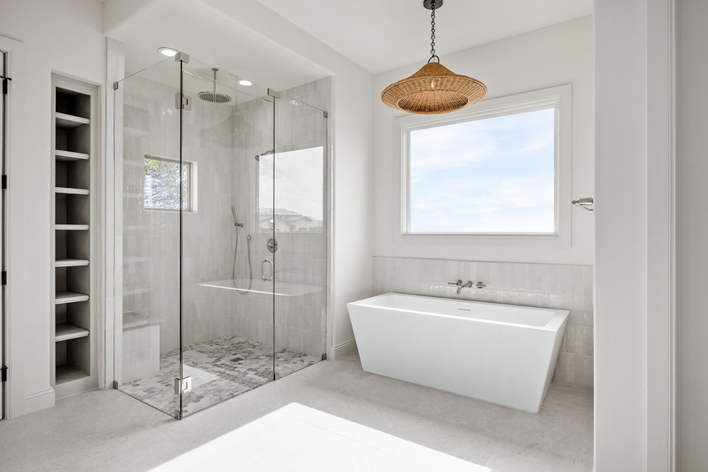 3613 Ranch View Court Kerrville, TX 78028 - Photo 17 of 41 a bathroom with a bathtub and a shower